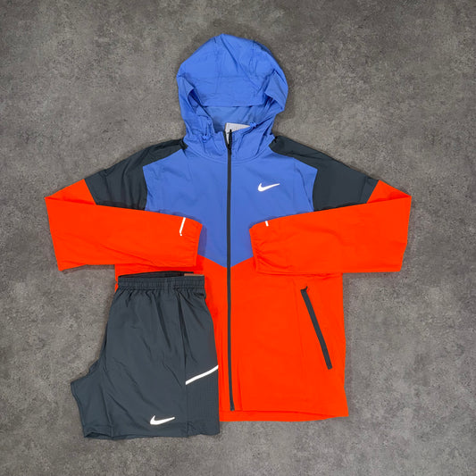 NIKE UV WINDRUNNER SET (ORANGE/BLUE)
